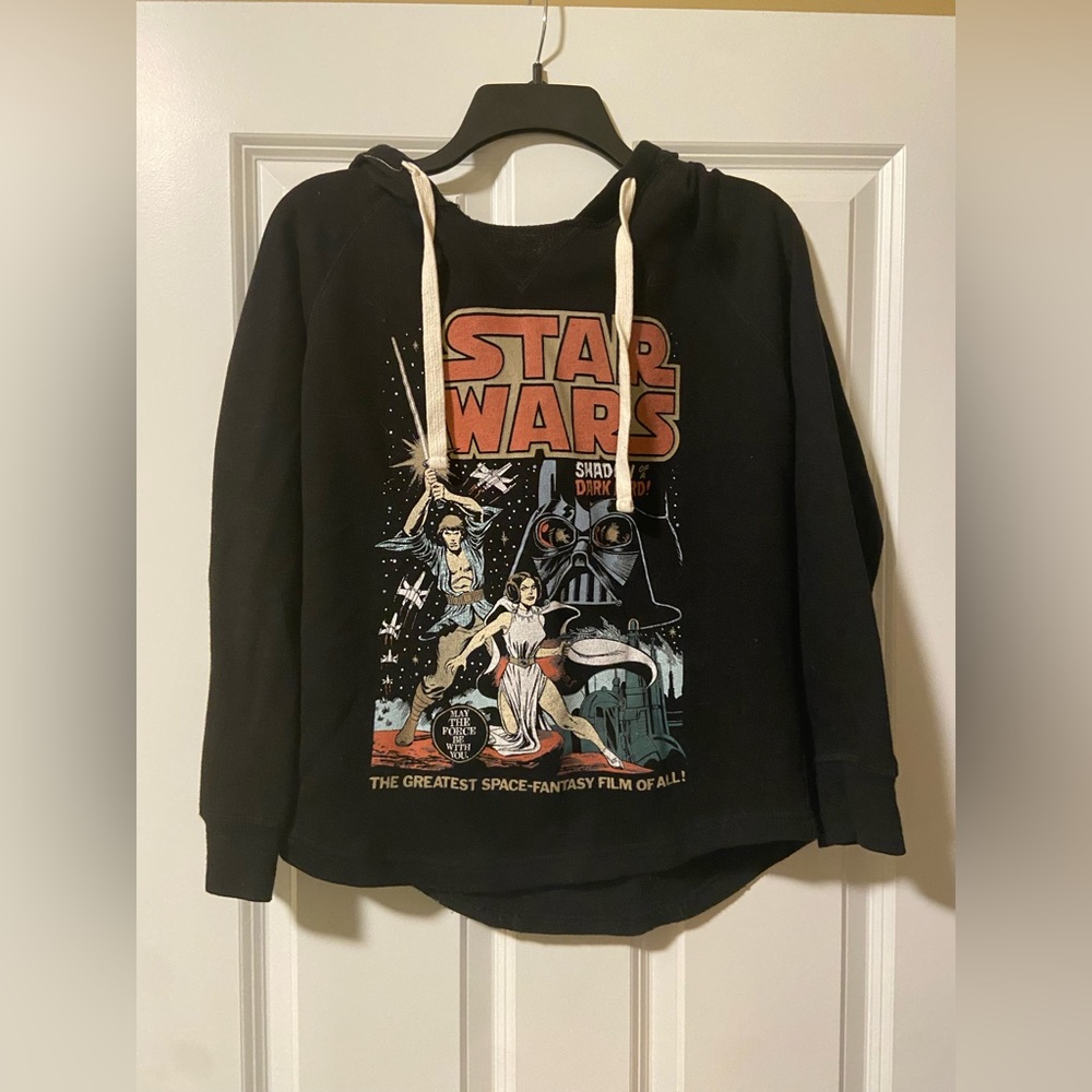 Star Wars hooded sweatshirt.  No size tag but fits close to small/medium.